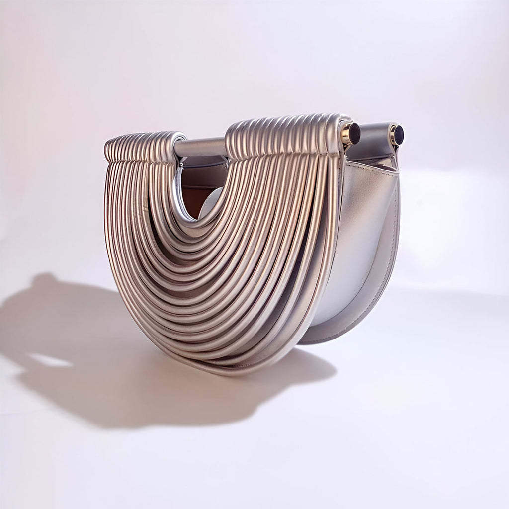 Estela – Bolso metálico escultural