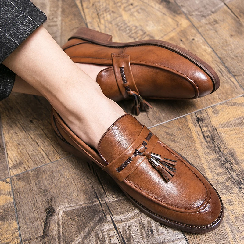 Mocasines de piel con borlas