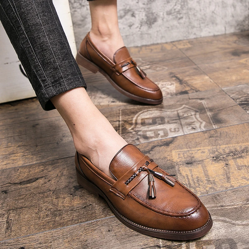 Mocasines de piel con borlas