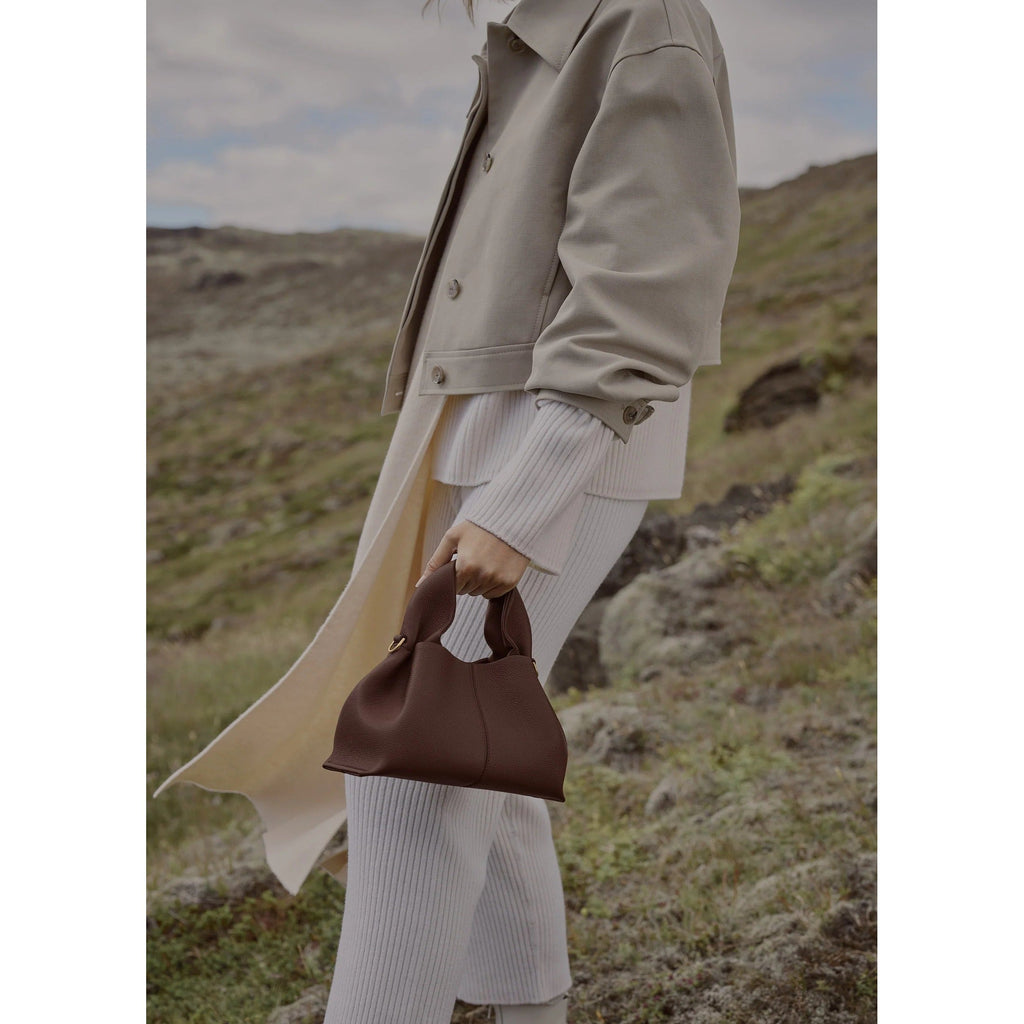Vega – Bolso de mano minimalista