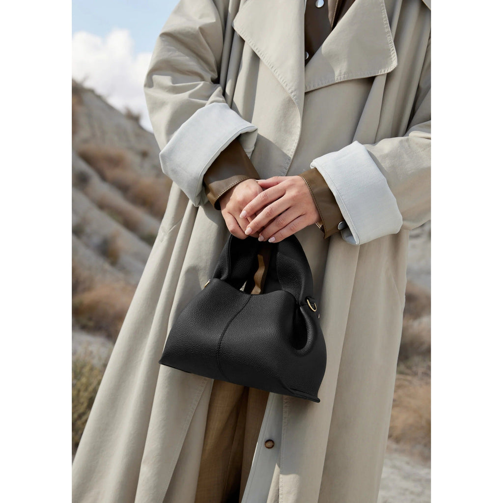 Vega – Bolso de mano minimalista