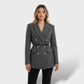 Abrigo de tweed con doble botonadura para mujer