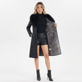 Chaqueta larga con cuello de piel