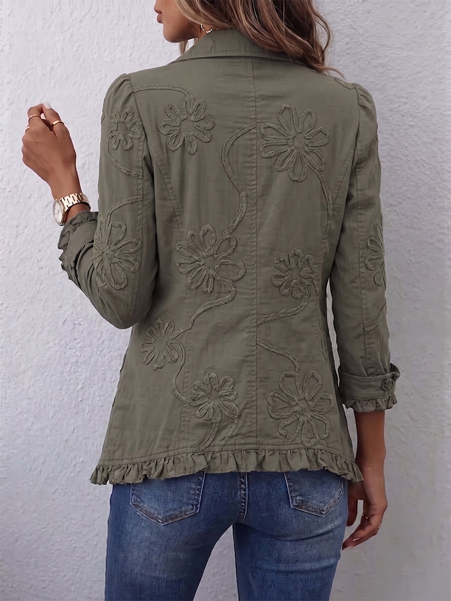 Chaqueta con bordados florales y volantes